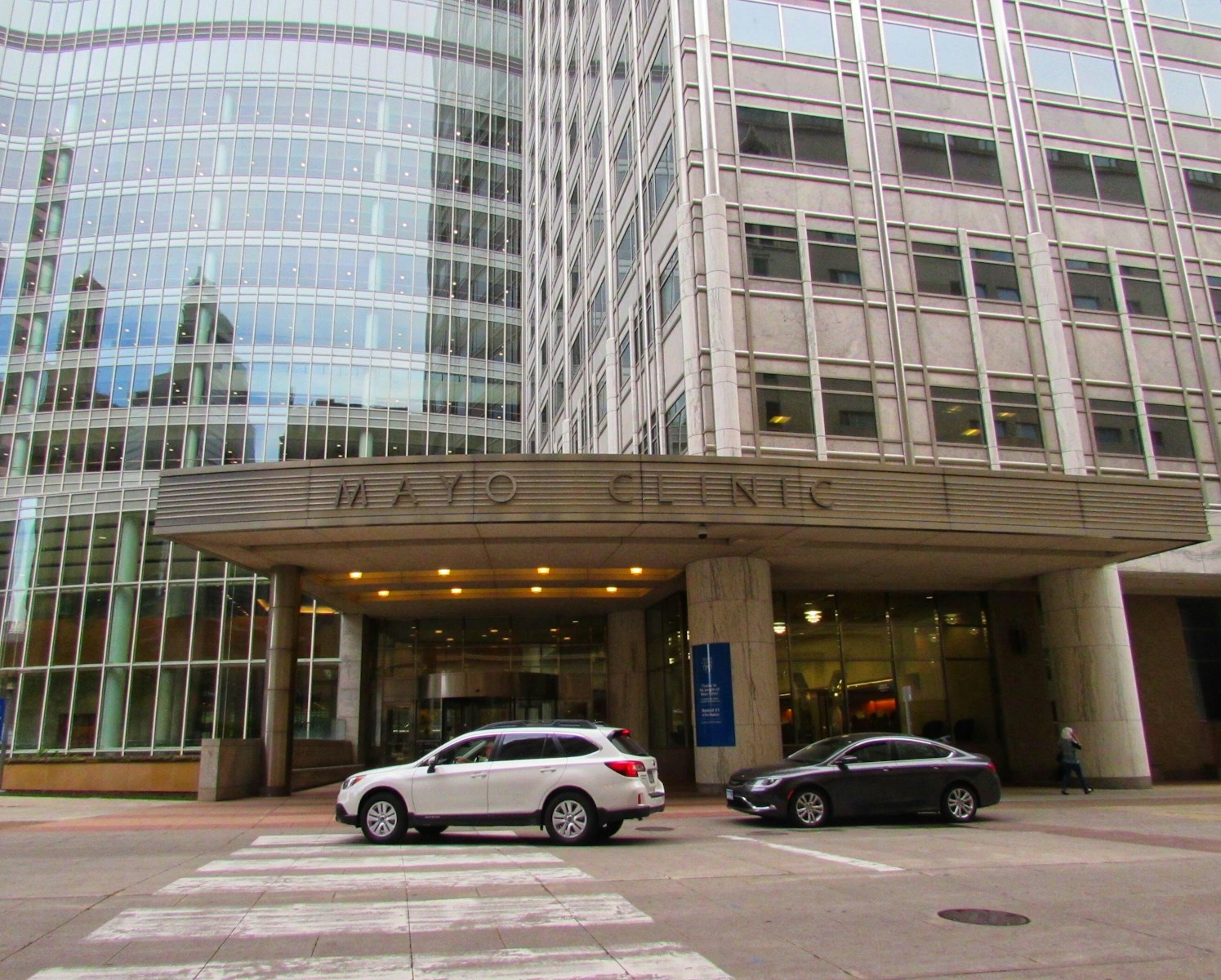 cars parked in front of building